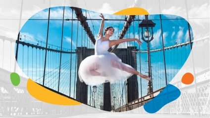 A female in a white dress jumping in the middle of a pedestrian bridge
