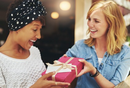 Two friends exchange gifts Zolo guide