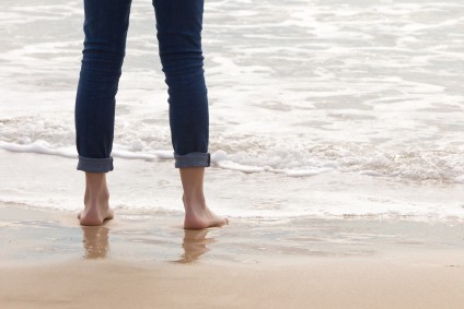 canada housing market in 2018. Feet wading into ocean wading into market
