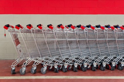 How to get multiple offers on a house. row of empty shopping carts in supermarket
