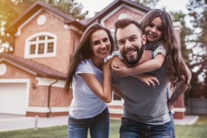 Finding an American Realtor happy family outside of home