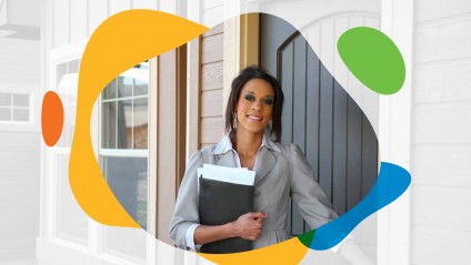 Young female homeowner entering new home