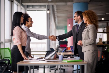 Agents and clients shaking hands new BC real estate rules
