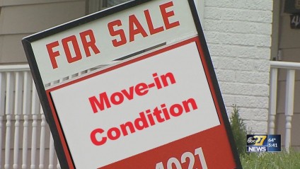For Sale sign mentioning move-in condition