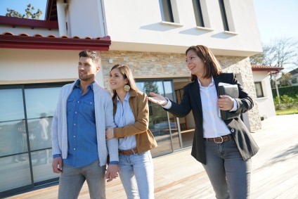 Couple looking at houses. Greater Vancouver buyer's market