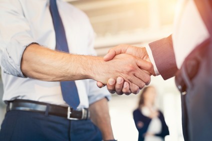 Sale of home complete with handshake