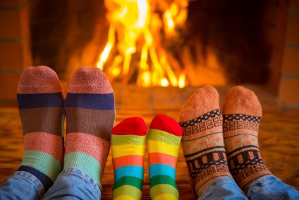 Family Near Fireplace during holiday season   gift guide 2019