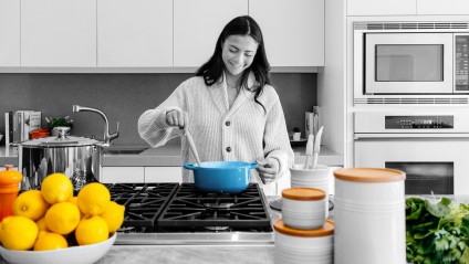 Woman is cooking in kitchen
