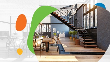 Beautiful, open concept condo interior with wood floors and a staircase