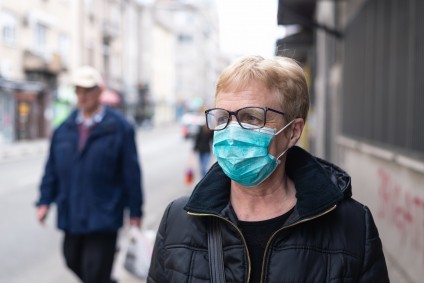 older woman with face mask COVID 19