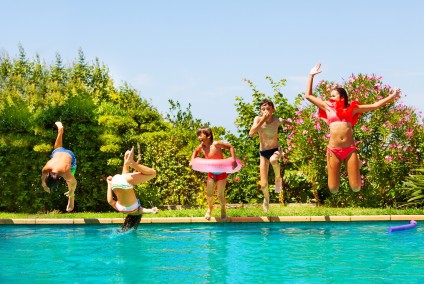 Kids Playing Pool Games During Backyard Party