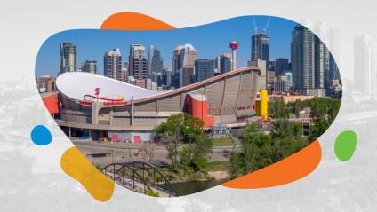 View of the Saddledome in front of the Calgary skyline
