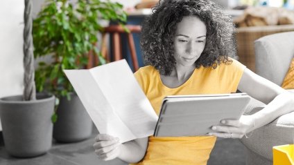 woman looks over personal finances