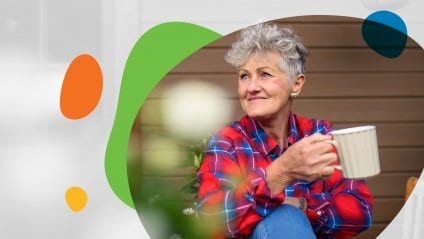 Senior enjoys coffee on balcony