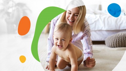 Woman chasing crawling baby