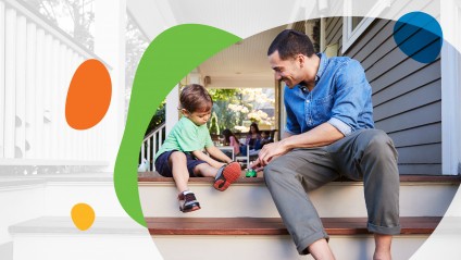 Father and son sit on porch