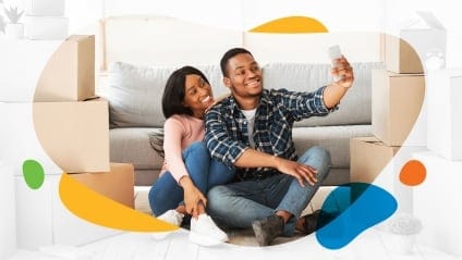 Couple takes selfie while packing