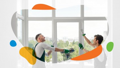 two workers replace window