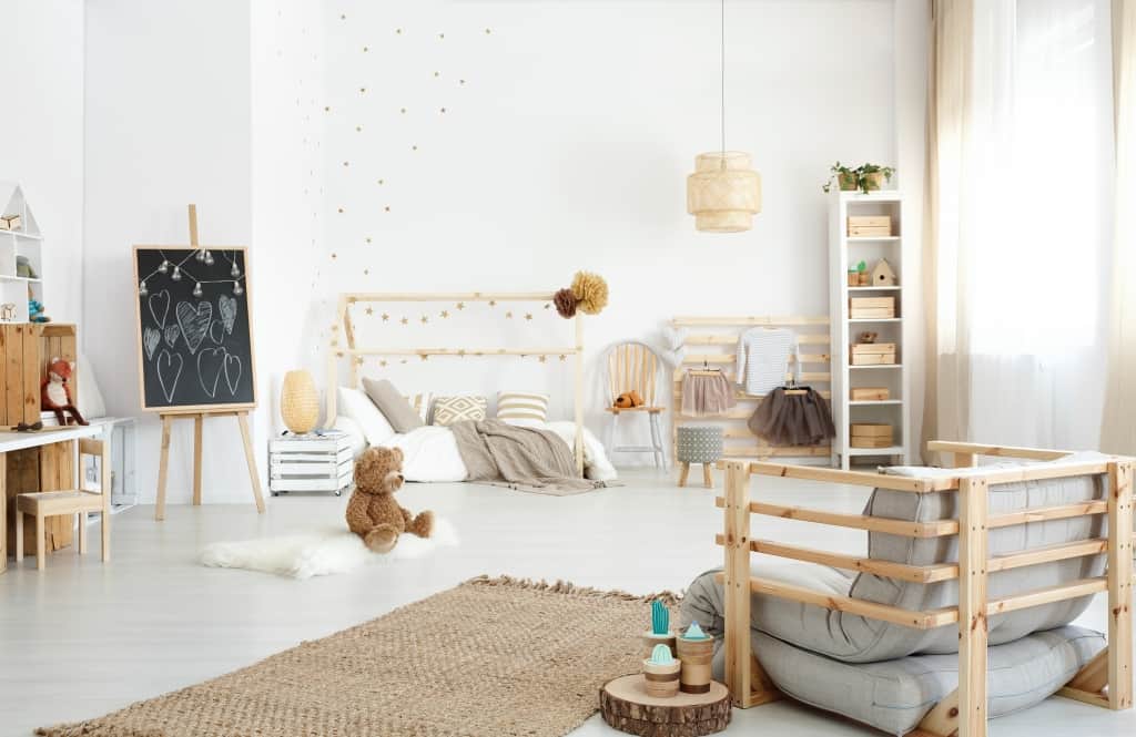 Spacious modern kid's bedroom with armchair toys and diy accessories