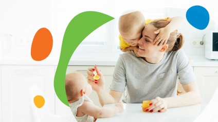 mom feeds children in new kitchen