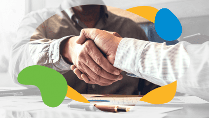men shaking hands over a contract