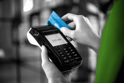 swiping a credit card on machine