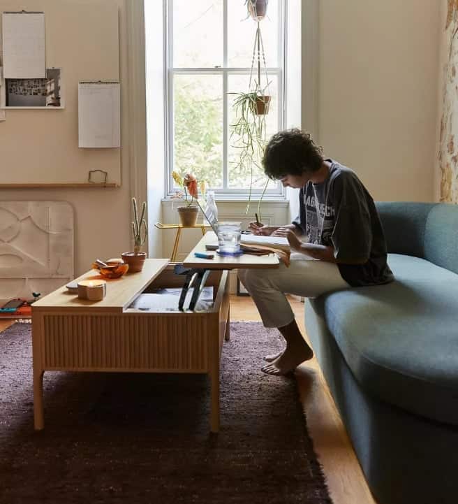 how to decorate small living rooms with pop up coffee tables