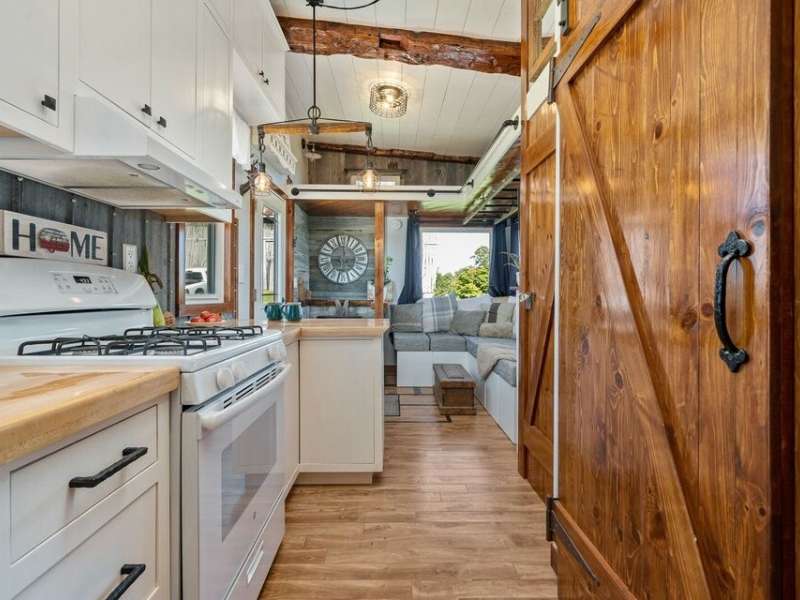 Farmhouse style tiny home with wood beams in Brock