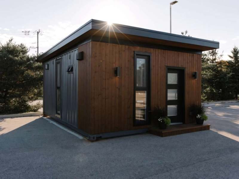 dark wood square tiny home for sale in Collingwood, Ontario