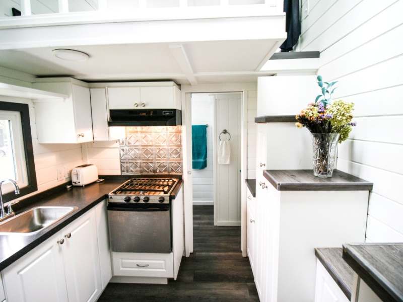 tiny home interior, white kitchen in Mount Forest, Ontario