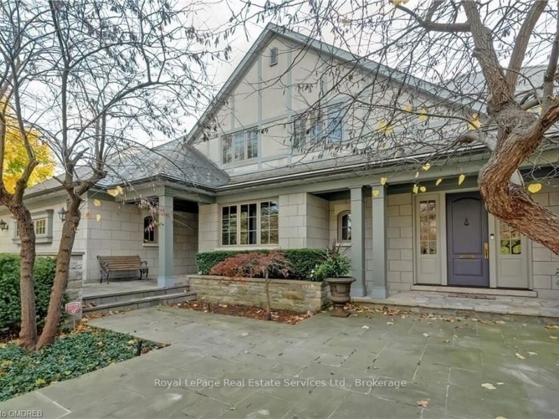 light grey tudor house in Oakville Ontario