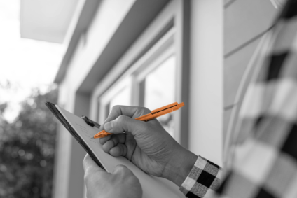 home inspector with a checklist